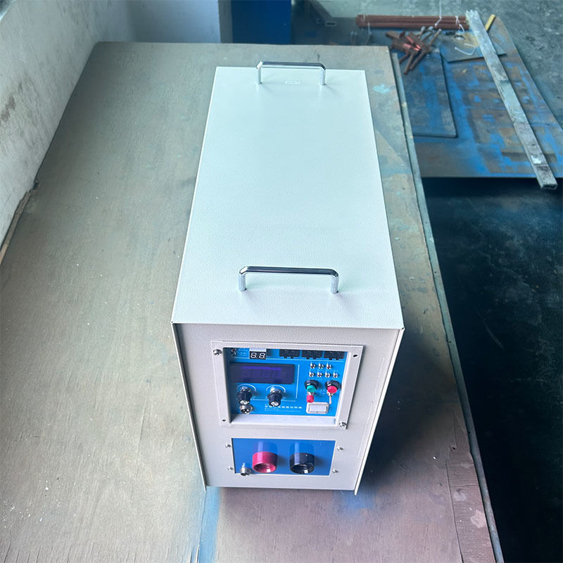 手持ちのインダクション加熱機 220V スチールモーター ボルト 鍛造 PLC コアコンポーネント ステンレス スチール インダクション加熱設備